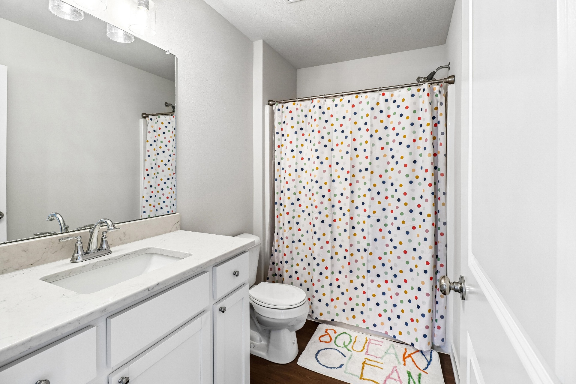 Upstairs full bath with quartz vanity and tub-shower combo