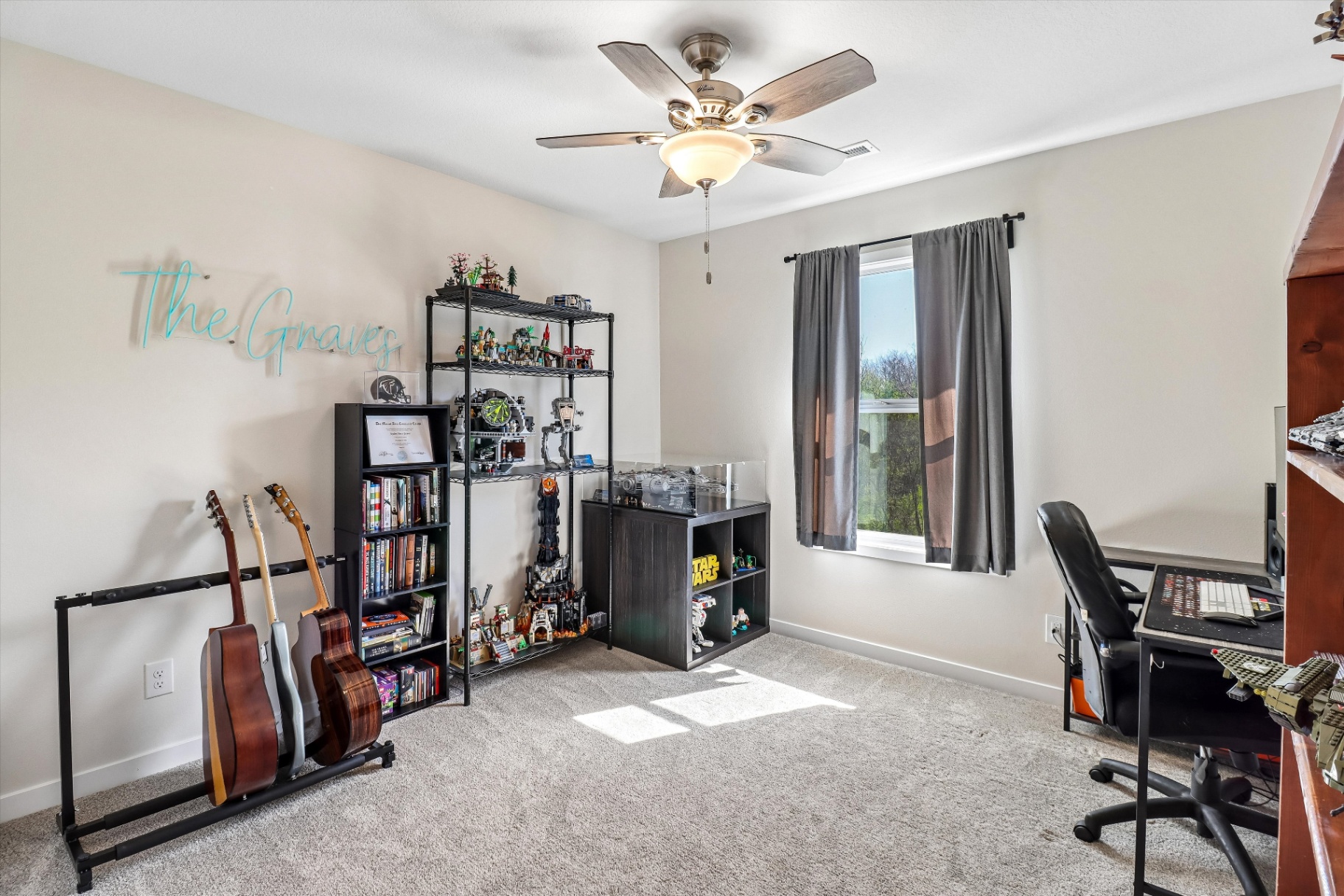 Additional upstairs bedroom set up as a music and hobby room