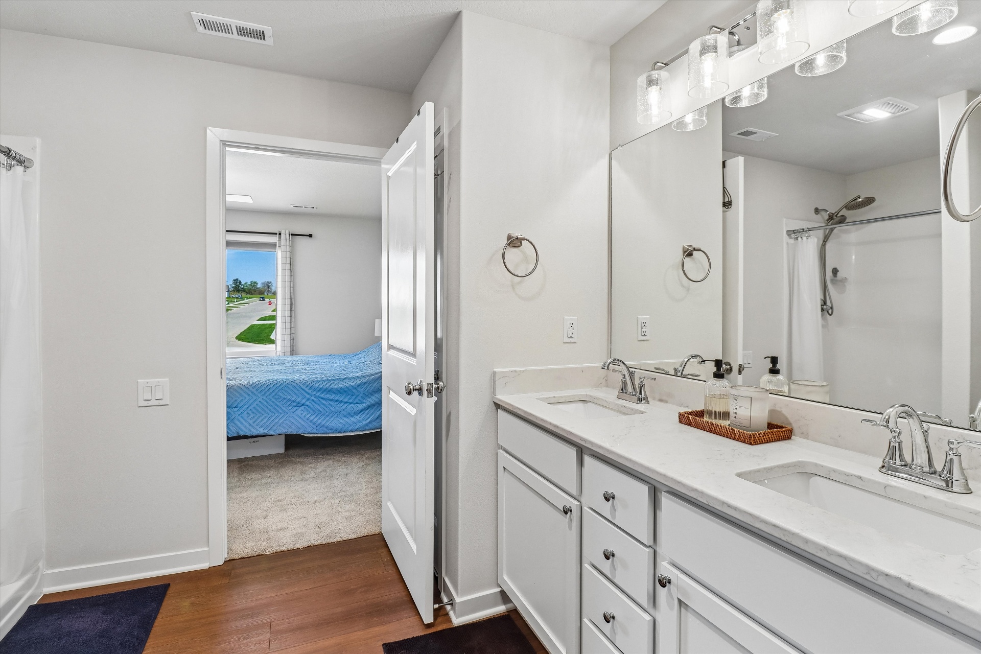 Primary bath with double vanity and generous countertops