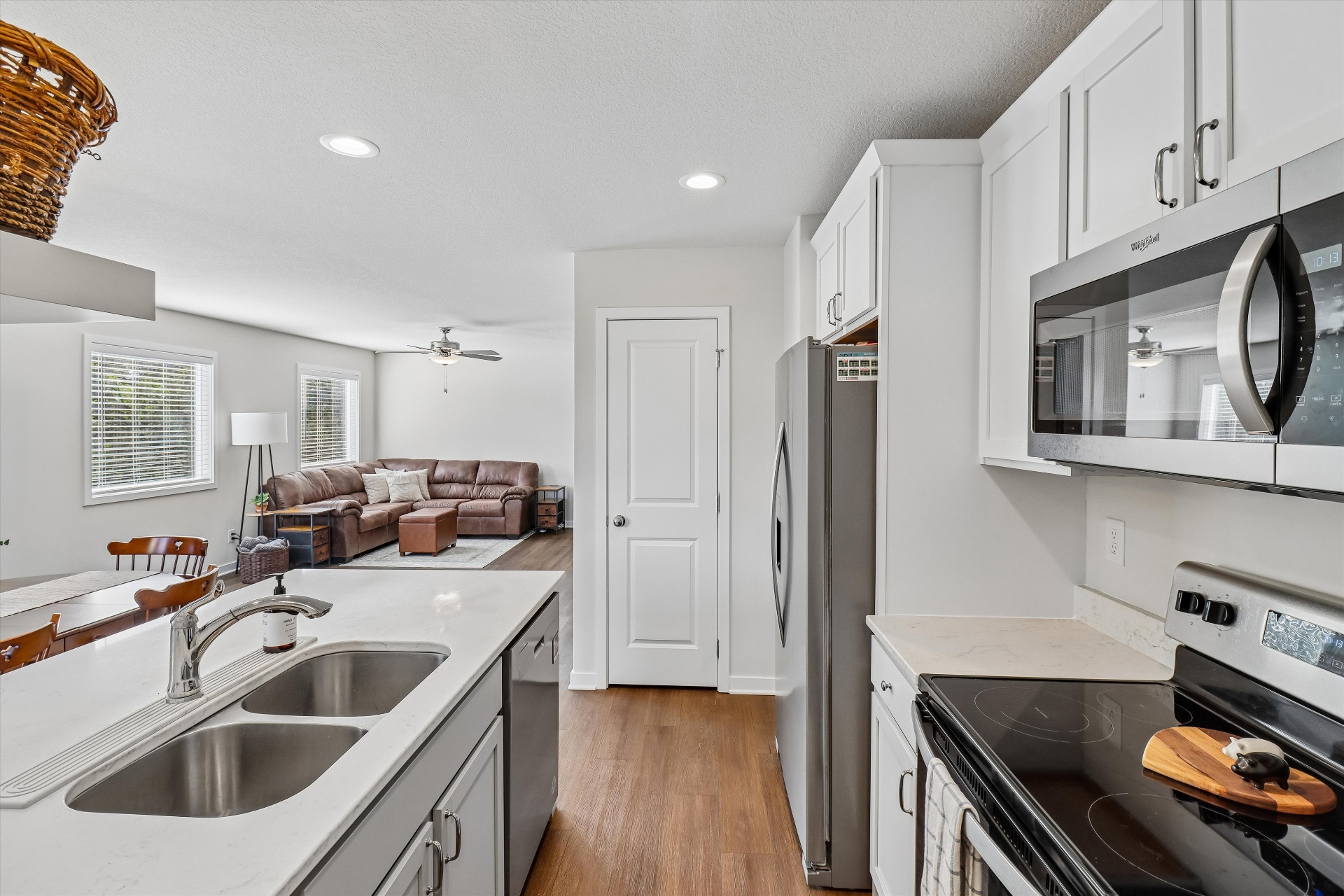 Kitchen opens straight to the family room — true open-concept living