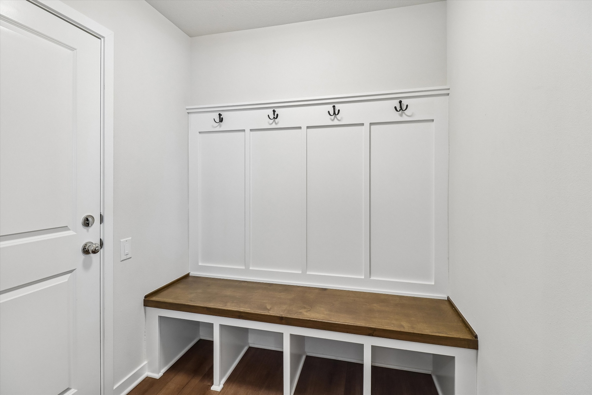 Custom mudroom drop-zone with bench and board-and-batten