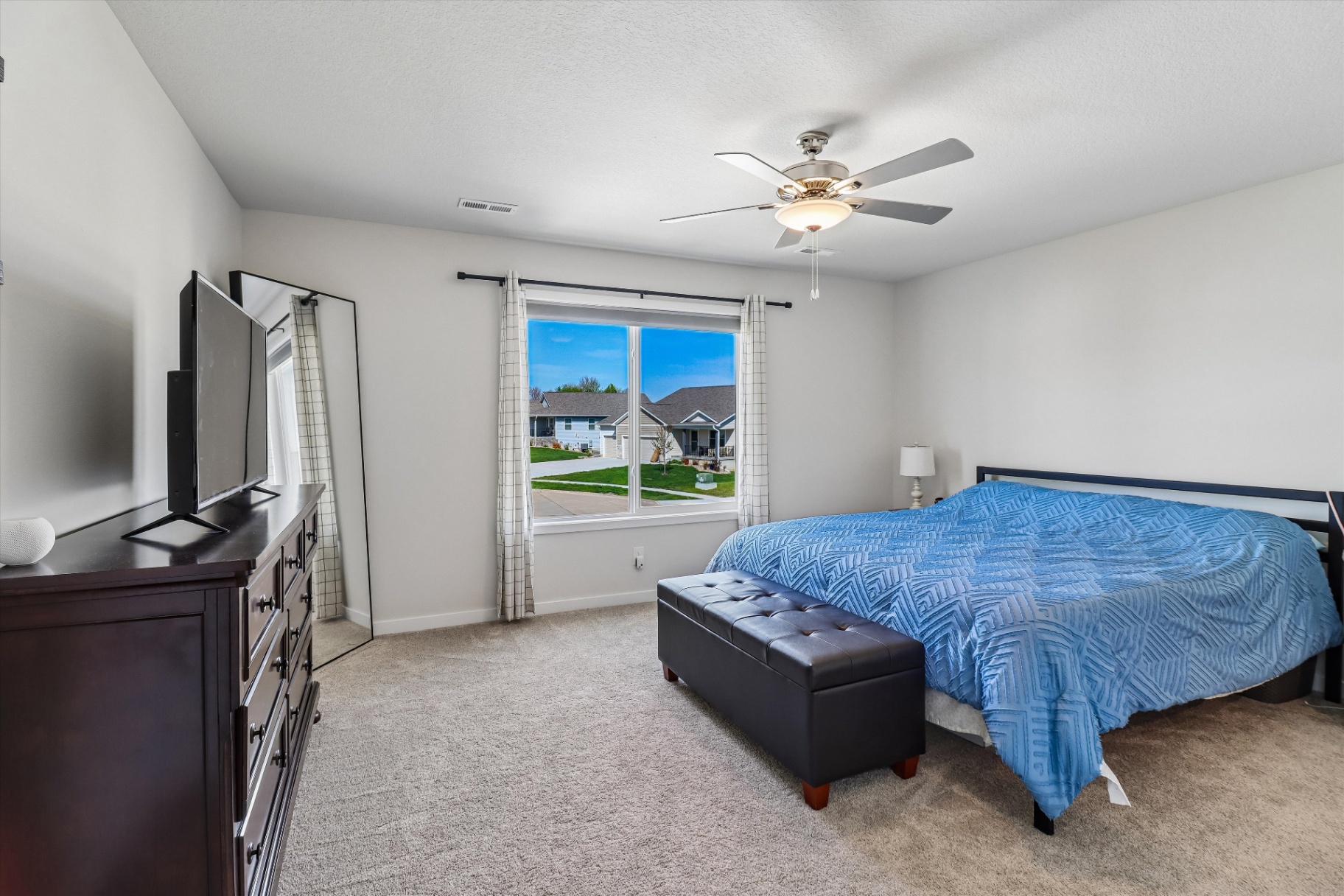 Primary bedroom with room for a king and direct access to the bath